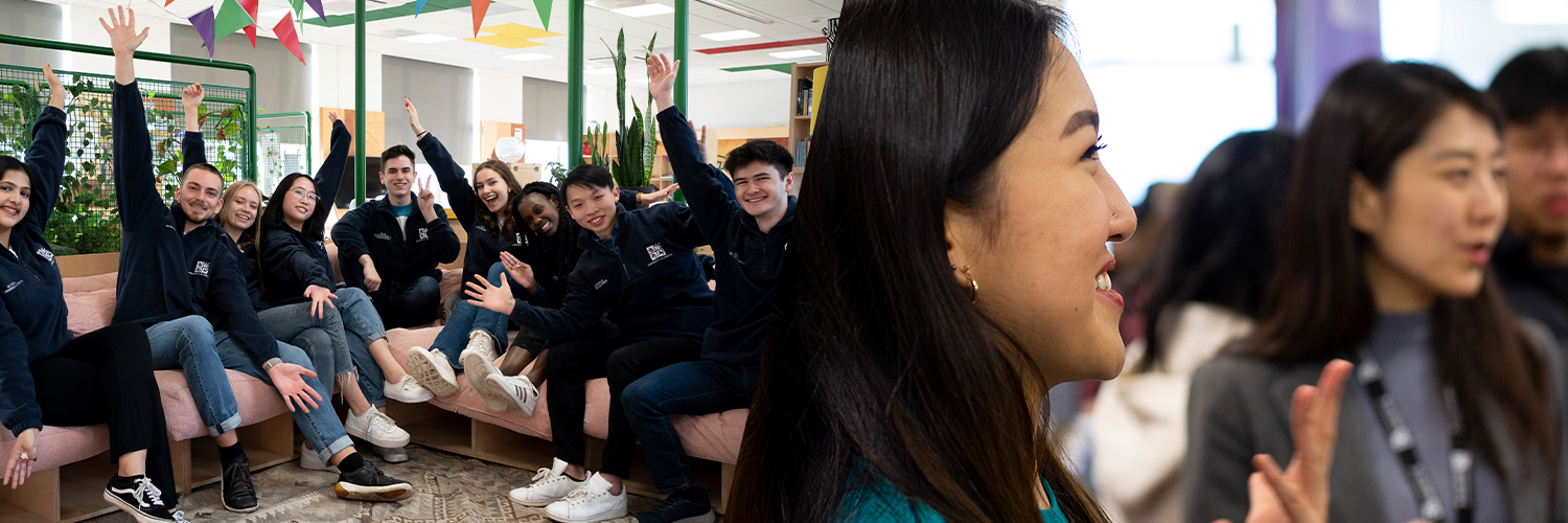 A diverse group of young people smiling at the camera